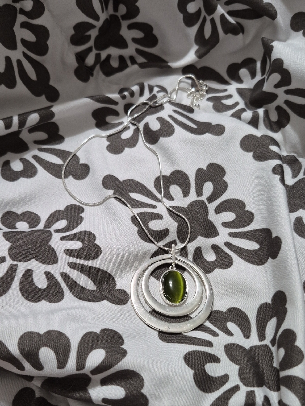 Sterling Silver Circle Pendant Necklace with Olive Green Stone